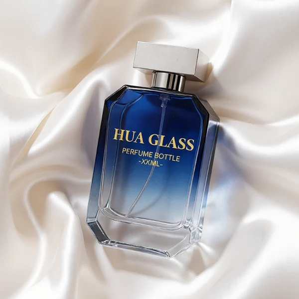 HUA0329 perfume bottle, multifaceted semi-transparent gradient green, blue, or red glass body with beveled polyhedral cutting and clear base, 30 ml, 50 ml, or 100 ml liquid, wide rectangular silver plastic cap with matching silver bottle neck, gold printed logo on bottle surface, modern geometric luxury design, ideal for gifting and daily use.