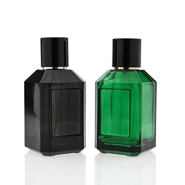 HUA0330 perfume bottle, multifaceted semi-transparent black or green glass body with polyhedral faceted cutting and thick base, 35 ml, 50 ml, or 100 ml liquid, glossy black cylindrical cap, clean blank bottle surface, modern geometric luxury design, ideal for gifting and daily use.