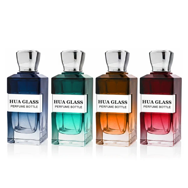 HUA0332 perfume bottle, rectangular semi-transparent gradient black or transparent colorless glass body with smooth curved edges and thick base, 100 ml liquid, rounded square-shaped glossy plastic cap in gold or silver finish, brand logo label attached on bottle surface, modern geometric luxury design, ideal for gifting and daily use.