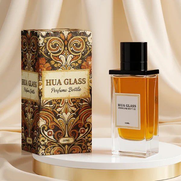 HUA0336 perfume bottle, rectangular transparent colorless glass body with thick base, 100 ml liquid, T-shaped aluminum and magnetic cap with cylindrical upper structure and horizontal flat top in black or gold finish, label attached on bottle surface, modern minimalist luxury design, ideal for gifting and daily use.