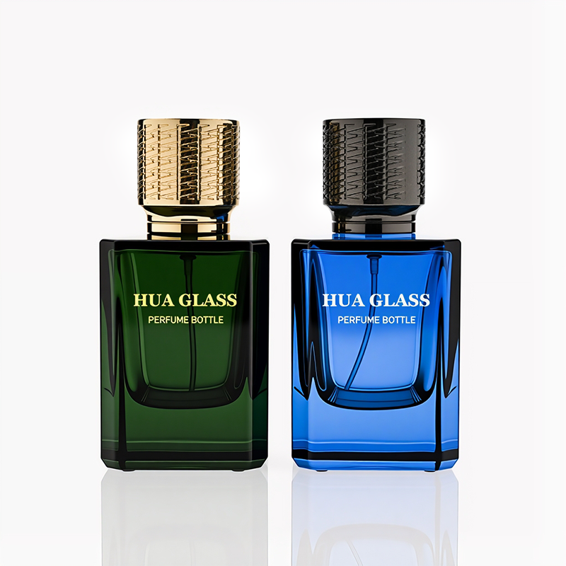 HUA0308 perfume bottle, semi-transparent blue or dark green customizable glass body with thick base and clean rectangular silhouette, 30 ml, 50 ml, or 100 ml liquid, textured cylindrical plastic cap in gold or black finish, gold or white printed logo on bottle surface, modern masculine luxury design, ideal for gifting and daily use.