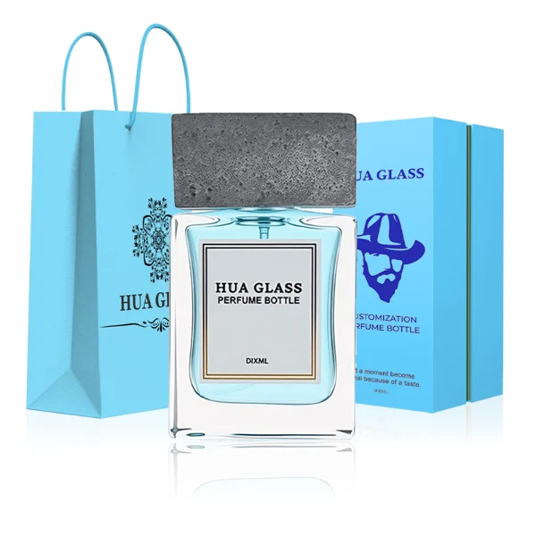 HUA0341 perfume bottle, rectangular transparent colorless glass body with thick base and curved inner contour, 50 ml liquid, oversized rectangular artificial stone cap with matte textured surface, no bottle neck, brand logo label attached on bottle surface, modern architectural luxury design, ideal for gifting and daily use.
