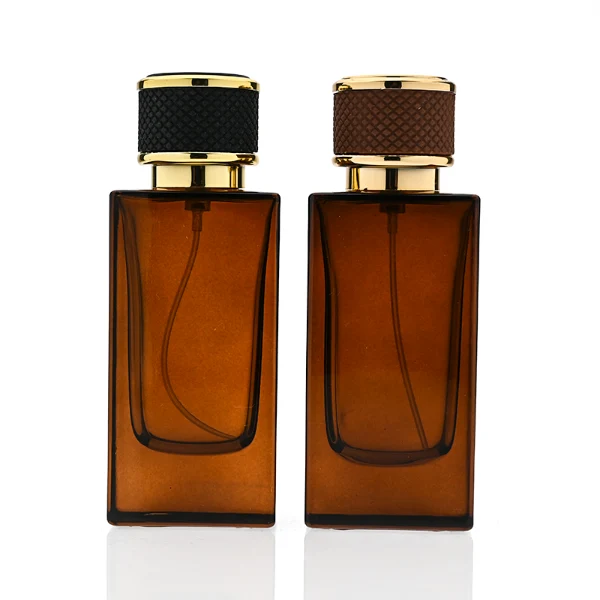 HUA0347 perfume bottle, rectangular amber glass body with thick base and smooth beveled edges, gold plastic cap wrapped in black or brown leather, luxury minimalist fragrance packaging design, ideal for gifting and personal fragrance use
