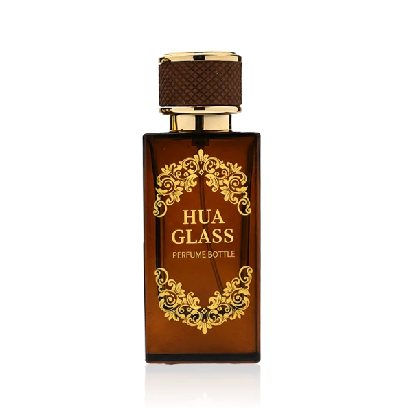 HUA0347 perfume bottle, rectangular amber glass body with thick base and smooth beveled edges, gold plastic cap wrapped in black or brown leather, luxury minimalist fragrance packaging design, ideal for gifting and personal fragrance use