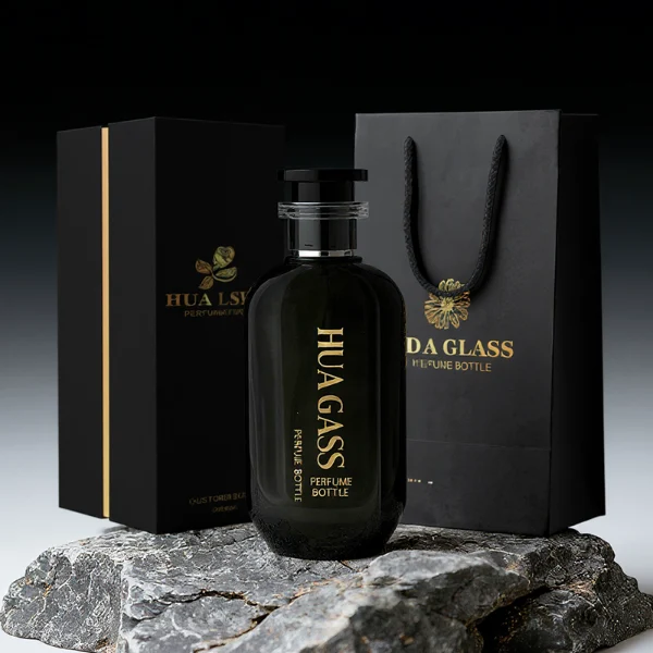 HUA0354 perfume bottle, cylindrical glass body in black, green, and blue with vertical gold printed logo, black plastic cap with a transparent accent ring, modern bold luxury fragrance packaging design available in 50ml and 100ml