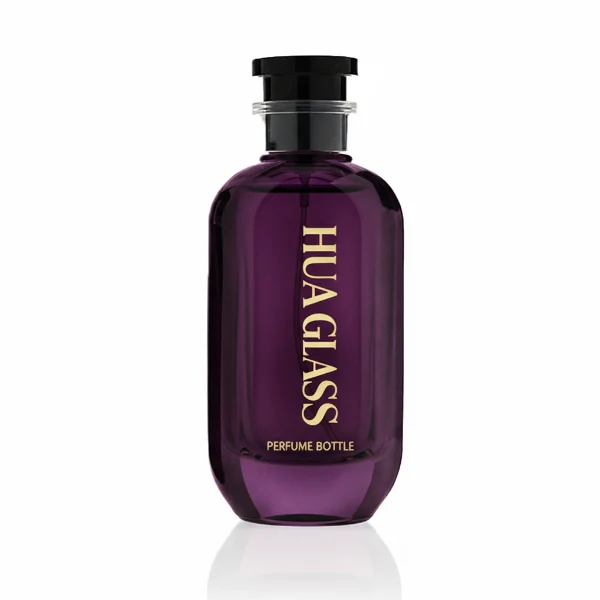 HUA0354 perfume bottle, cylindrical glass body in black, green, and blue with vertical gold printed logo, black plastic cap with a transparent accent ring, modern bold luxury fragrance packaging design available in 50ml and 100ml