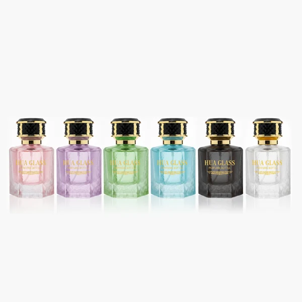 HUA0358 perfume bottle, hexahedral column glass body in translucent blue, pink, and purple with gold neck and gold printed logo, black mesh-textured plastic cap, chic contemporary fragrance packaging design available in 50ml and 100ml