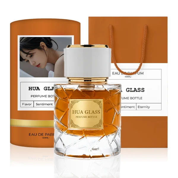 HUA0362 perfume bottle, textured ice-crack cylindrical clear glass body with gold neck and gold aluminum label, straight cylindrical white plastic cap with luxury gold trim, modern artistic luxury fragrance packaging design available in 50ml and 100ml
