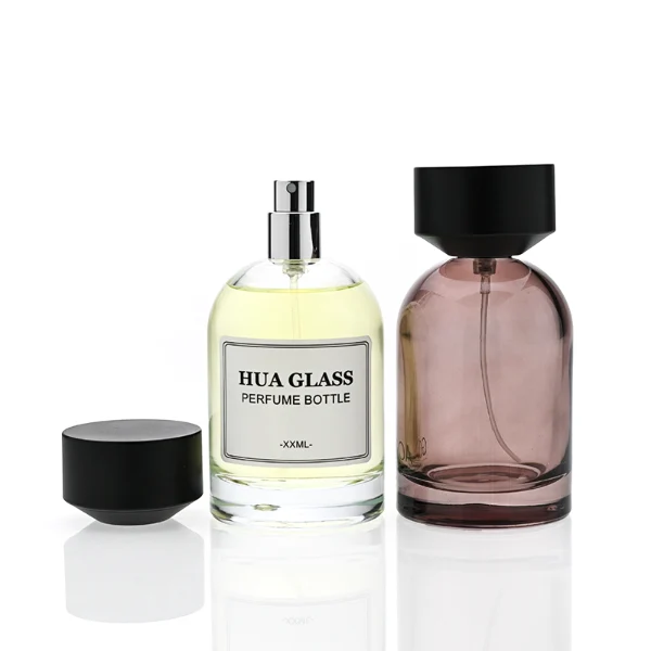 HUA0364 perfume bottle, round cylindrical glass body in translucent grey, red, and blue with gold printed logo, matte black inverted cone plastic cap, contemporary minimalist luxury fragrance packaging design available in 50ml and 100ml