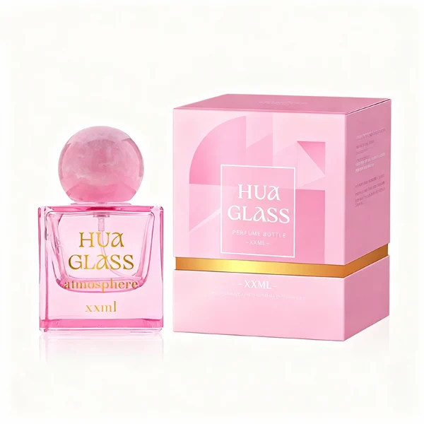 HUA0367 perfume bottle, square cubic glass body in translucent pink or amber orange with gold printed logo, oversized spherical ball plastic cap with marble veins texture, contemporary artistic pop luxury fragrance packaging design available in 30ml, 50ml, and 100ml