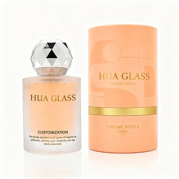 HUA0368 perfume bottle, frosted cylindrical glass body in translucent peach, purple, and blue with gold printed logo, spherical multi-faceted diamond-cut plastic cap in shiny silver finish, dreamy modern luxury fragrance packaging design available in 30ml, 50ml, and 100ml