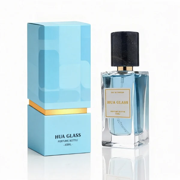 HUA0369 perfume bottle, rectangular cuboid clear glass body with centered paper label, premium cylindrical natural marble cap in white veined, jade green, and dark blue stone textures with gold or silver neck, Nordic minimalist luxury fragrance packaging design available in 30ml, 50ml, and 100ml