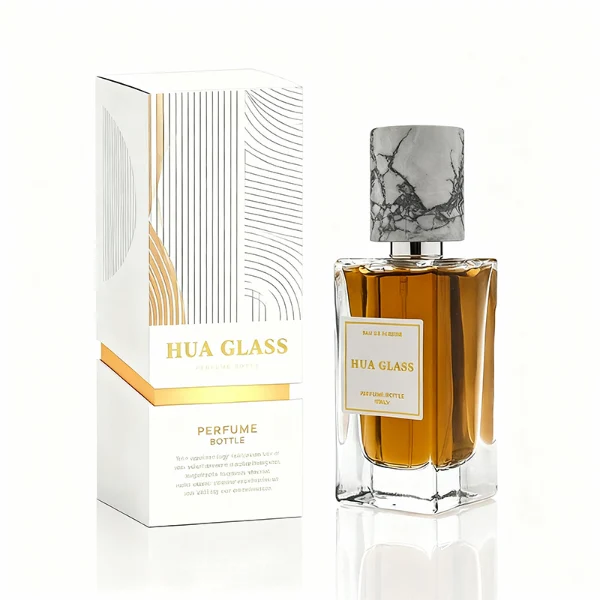 HUA0369 perfume bottle, rectangular cuboid clear glass body with centered paper label, premium cylindrical natural marble cap in white veined, jade green, and dark blue stone textures with gold or silver neck, Nordic minimalist luxury fragrance packaging design available in 30ml, 50ml, and 100ml