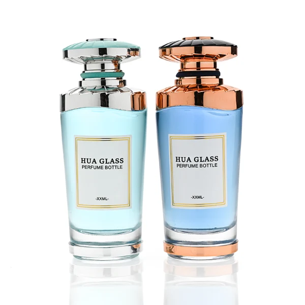 HUA0371 perfume bottle, inverted tapered glass body in translucent green or blue with centered paper label, ribbed umbrella-shaped plastic cap in mint green with silver or shiny black with rose gold wave shoulder accents, avant-garde luxury fragrance packaging design available in 50ml and 100ml