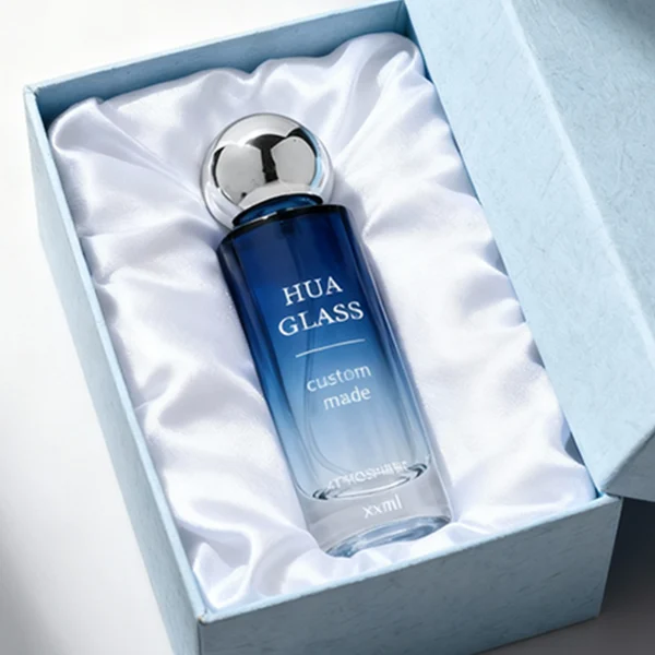 HUA0380 perfume bottle, slim cylindrical translucent glass body with colorful ombre gradient coating and white brand logo and text, sleek spherical dome plastic cap in shiny silver, modern minimalist luxury fragrance packaging design available in 30ml, 50ml, and 100ml