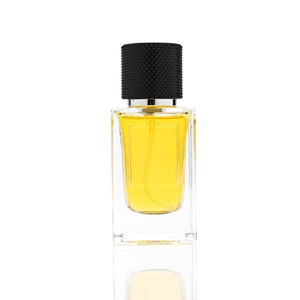 HUA0382 perfume bottle, square cubic clear glass body with architectural vertical fluting flutes, shiny gold neck and centered gold rectangular label, diamond knurled cylindrical plastic cap in deep brown or black matte finishes, luxury niche fragrance packaging design available in 50ml and 100ml