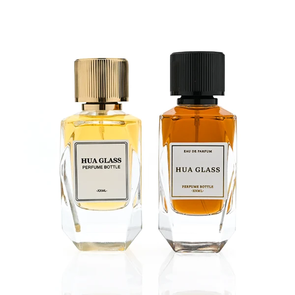 HUA0383 perfume bottle, multi-faceted geometric cut clear glass body with centered paper label, vertical ribbed cylindrical aluminum cap and matching neck ring in radiant gold or shiny black, modern architectural luxury fragrance packaging design in 50ml