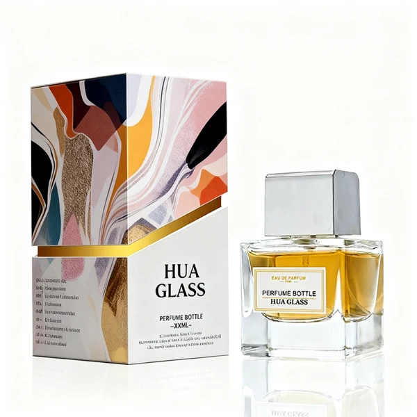 HUA0386 perfume bottle, flat rectangular cuboid clear glass body with heavy bottom and centered paper label, square cubic magnetic plastic cap in matte silver-grey or glossy black finishes, premium magnetic closure fragrance packaging design available in 30ml, 50ml, and 100ml