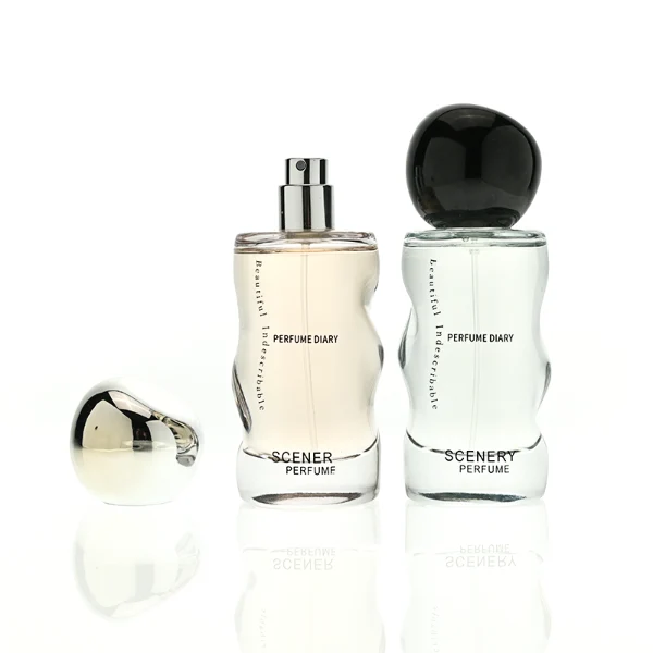 HUA0389 perfume bottle, wavy contoured cylindrical translucent colored glass body with centered gold brand logo and text, sleek spherical dome plastic cap in shiny silver chrome, avant-garde luxury fragrance packaging design in 50ml