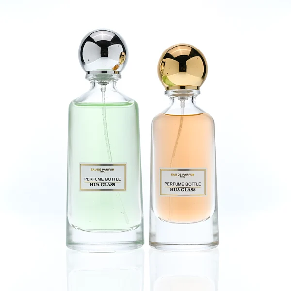 HUA0398 Perfume Bottle – Elongated Clear Glass with Heavy Bottom and Shiny Spherical Magnetic Plastic Cap, Modern Luxury Design (1)