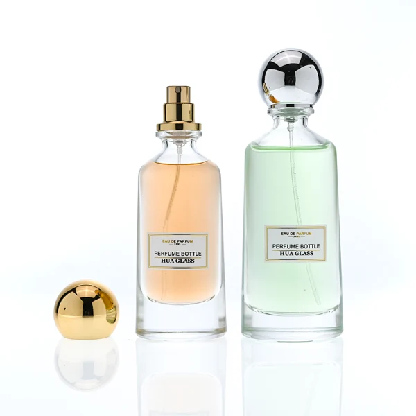 HUA0398 Perfume Bottle – Elongated Clear Glass with Heavy Bottom and Shiny Spherical Magnetic Plastic Cap, Modern Luxury Design (2)