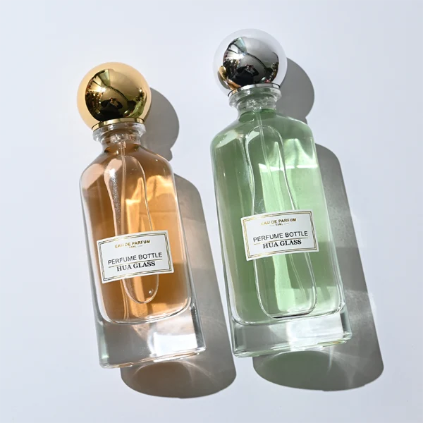 HUA0398 Perfume Bottle – Elongated Clear Glass with Heavy Bottom and Shiny Spherical Magnetic Plastic Cap, Modern Luxury Design (4)