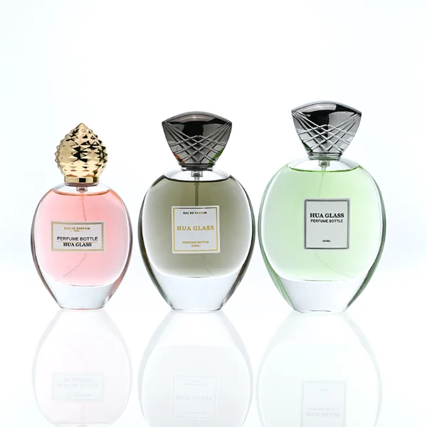 HUA0399 Perfume Bottle – Oval Clear Glass with Heavy Bottom and Textured Engraved Zinc Alloy Cap, Royal Luxury Design (4)