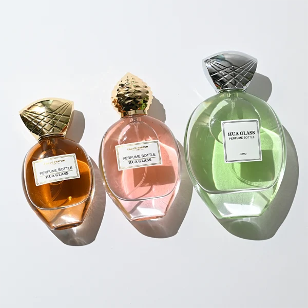 HUA0399 Perfume Bottle – Oval Clear Glass with Heavy Bottom and Textured Engraved Zinc Alloy Cap, Royal Luxury Design (7)