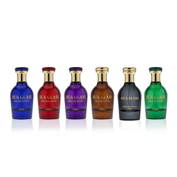 HUA0401 perfume bottle, pear-shaped translucent colored glass body in blue, red, green or black with centered gold brand logo, flat disc plastic cap and matching elongated tapered neck in shiny radiant gold, regal luxury fragrance packaging design in 100ml
