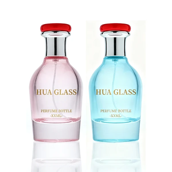 HUA0401 perfume bottle, pear-shaped translucent colored glass body in blue, red, green or black with centered gold brand logo, flat disc plastic cap and matching elongated tapered neck in shiny radiant gold, regal luxury fragrance packaging design in 100ml