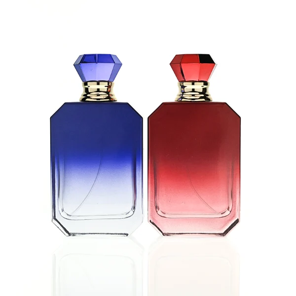 HUA0410 perfume bottle, luxury beveled corner square glass bottle with vibrant gradient or solid finish in black, yellow, pink, or red, featuring a printed gold logo, a silver-colored collar, and a faceted diamond-cut geometric plastic cap, modern elegant fragrance packaging design available in 30ml, 50ml, and 100ml