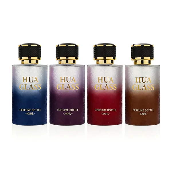 HUA0411 perfume bottle, luxury cylindrical glass bottle with glossy spray colored multi-color finish in pink or pink-blue gradient, featuring a gold-colored collar and a unique textured leather-wrapped plastic cap with gold-colored trim, modern elegant fragrance packaging design available in 30ml, 50ml, and 100ml