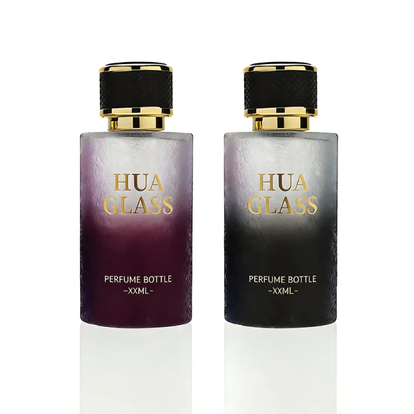 HUA0411 perfume bottle, luxury cylindrical glass bottle with glossy spray colored multi-color finish in pink or pink-blue gradient, featuring a gold-colored collar and a unique textured leather-wrapped plastic cap with gold-colored trim, modern elegant fragrance packaging design available in 30ml, 50ml, and 100ml