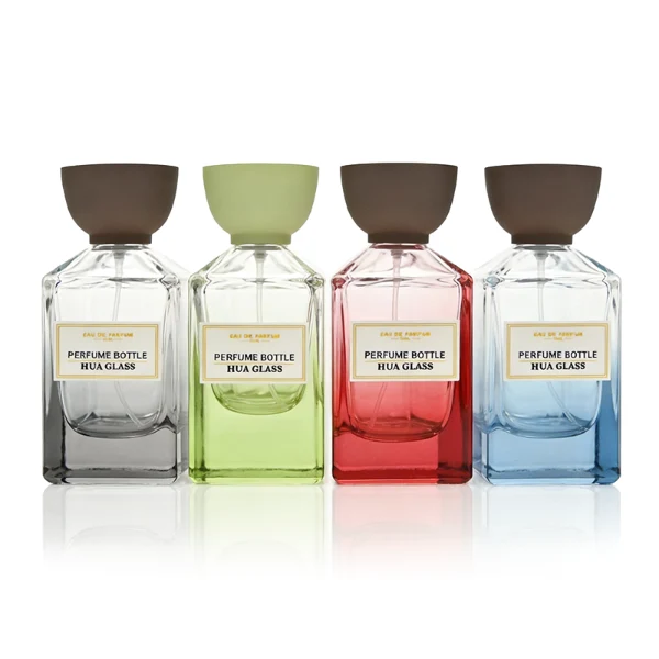HUA0417 perfume bottle, luxury square glass bottle with a heavy base and high-transparency finish showing colored liquid, featuring a gold-bordered square paper label and a unique tapered cup-shaped plastic cap in glossy black or matte brown, modern elegant fragrance packaging design available in 30ml and 50ml