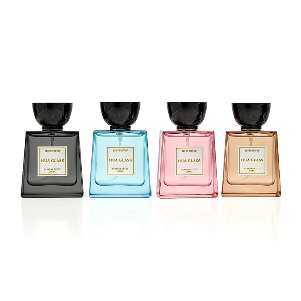 HUA0418 perfume bottle, luxury trapezoidal square glass bottle with a frosted matte multi-color finish in green, pink, blue, or yellow, featuring a bordered square paper label and a unique glossy black tapered cup-shaped plastic cap, modern elegant fragrance packaging design available in 30ml, 50ml, and 100ml