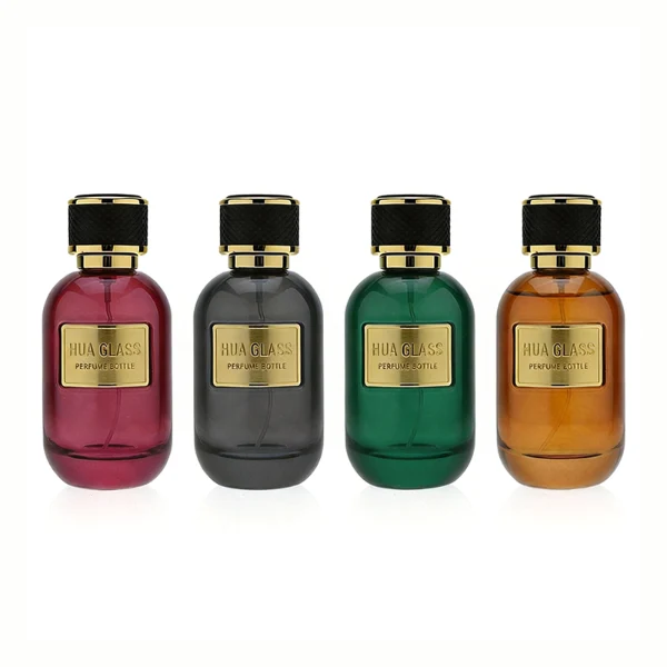 HUA0420 perfume bottle, luxury 100ml rounded oval glass bottle with translucent deep multi-color finish in red, grey, green, or brown, featuring a gold-colored aluminum label and a black textured leather-wrapped plastic cap with gold-colored trim, modern elegant fragrance packaging design