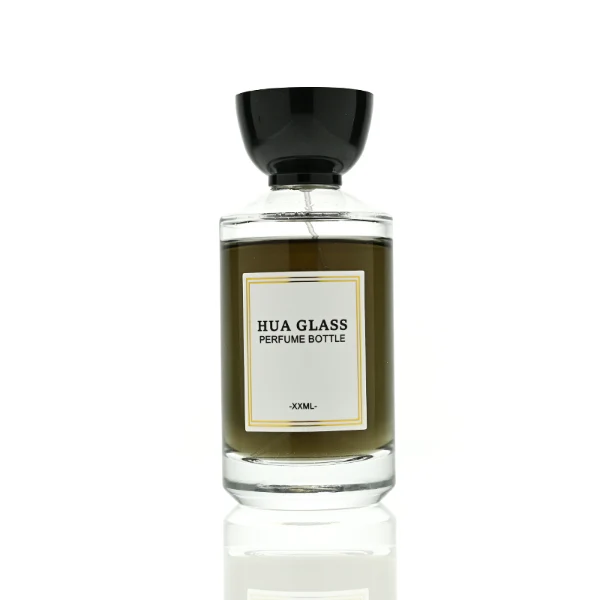 HUA0424 perfume bottle, luxury heavy-base cylindrical glass bottle with translucent deep multi-color finish, featuring a gold-bordered square paper label, a black neck ring, and a unique glossy black tapered cup-shaped plastic cap, modern elegant fragrance packaging design available in 30ml, 50ml, and 100ml
