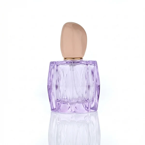 HUA0432 perfume bottle, luxury heavy-base rounded square glass bottle with wavy sculpted embossed patterns and high-transparency clear finish, featuring a unique irregular pebble-shaped plastic cap with a mirror-shine glossy rose gold finish, modern elegant fragrance packaging design