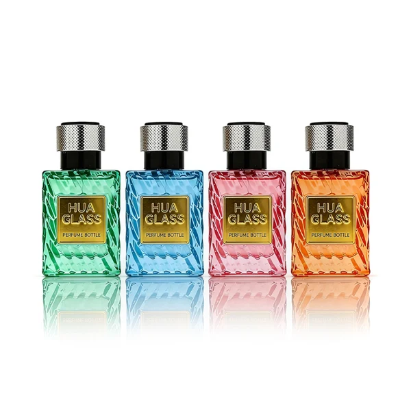 HUA0435 perfume bottle, luxury 50ml angular square glass bottle with wavy sculpted embossed patterns and translucent deep multi-color finish, featuring a metallic gold aluminum label and a glossy black cylindrical plastic cap encased with a textured silver-colored knurled band, modern elegant fragrance packaging design