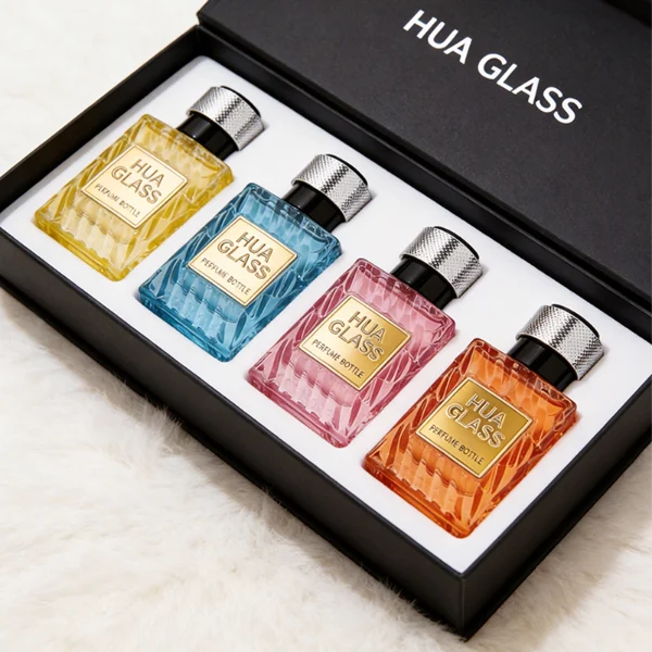 HUA0435 perfume bottle, luxury 50ml angular square glass bottle with wavy sculpted embossed patterns and translucent deep multi-color finish, featuring a metallic gold aluminum label and a glossy black cylindrical plastic cap encased with a textured silver-colored knurled band, modern elegant fragrance packaging design