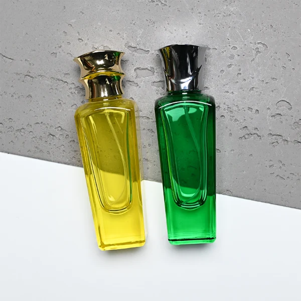 HUA0438 perfume bottle, luxury heavy-base elongated rectangular glass bottle with translucent deep multi-color finish, featuring a unique irregular bamboo-joint solid Zamak cap with a mirror-shine glossy metallic finish, modern elegant fragrance packaging design available in 50ml and 75ml