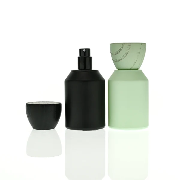 HUA0440 perfume bottle, luxury heavy-base matte finish cylindrical glass bottle with sloped shoulders, featuring a unique egg-shaped natural textured wooden cap showcasing visible organic wood grains in matching colorways, minimalist elegant fragrance packaging design available in 30ml, 50ml, and 100ml