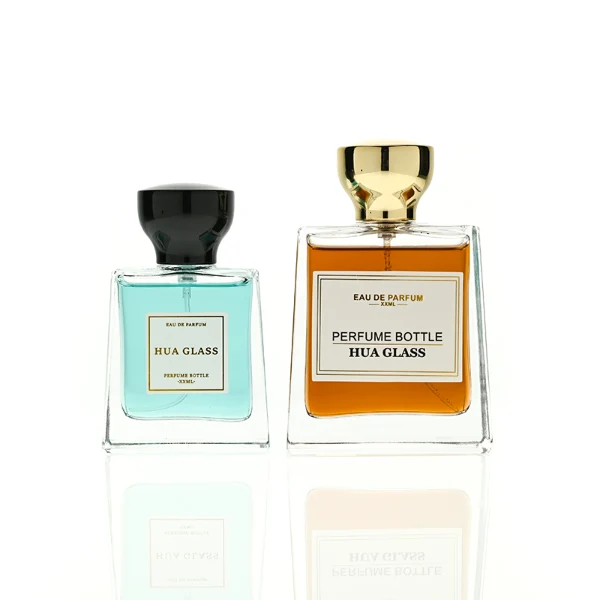 HUA0441 perfume bottle, luxury heavy-base trapezoidal glass bottle with high-transparency clear finish, featuring a bordered square paper label and a flared hourglass solid Zamak cap with a mirror-shine glossy finish, modern elegant fragrance packaging design available in 30ml, 50ml, and 100ml