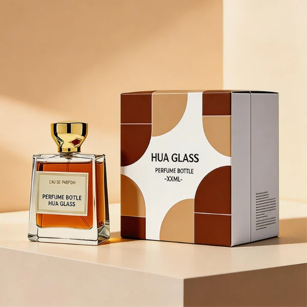 HUA0441 perfume bottle, luxury heavy-base trapezoidal glass bottle with high-transparency clear finish, featuring a bordered square paper label and a flared hourglass solid Zamak cap with a mirror-shine glossy finish, modern elegant fragrance packaging design available in 30ml, 50ml, and 100ml