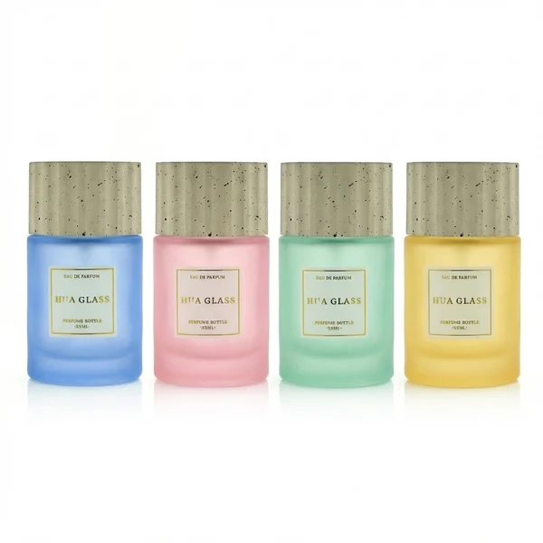 HUA0445 perfume bottle features a thick-bottomed cylindrical glass body paired with a modern textured cylindrical plastic cap. Designed for wholesalers, it offers 30ml, 50ml, and 100ml capacity options, combining an elegant round design with practical durability for diverse fragrance lines.
