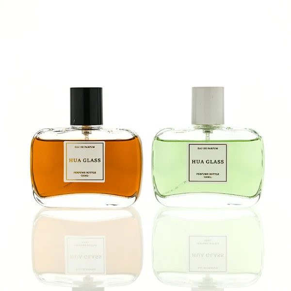 HUA0446 perfume bottle features a clear rounded and short rectangular glass body paired with a sleek cylindrical black or white plastic cap. Designed for wholesalers, it offers a 50ml capacity option, combining a modern minimalist style with durable functionality for diverse cosmetic fragrance lines.
