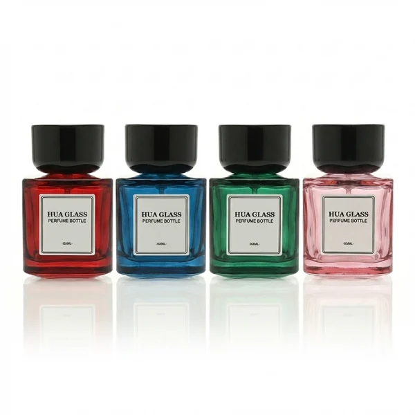 HUA0452 perfume bottle features a clear rounded square glass body paired with a smooth, thick cylindrical plastic cap. Designed for wholesalers, it offers 30ml, 50ml, and 100ml capacity options, combining an elegant minimalist design with functional durability.