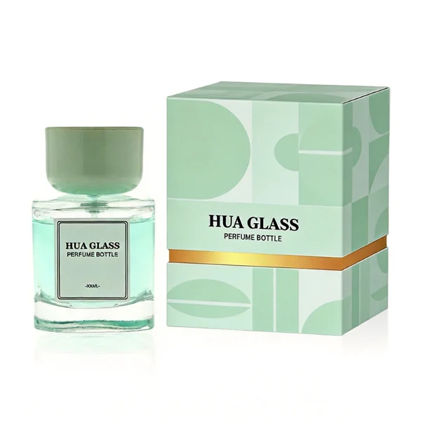 HUA0452 perfume bottle features a clear rounded square glass body paired with a smooth, thick cylindrical plastic cap. Designed for wholesalers, it offers 30ml, 50ml, and 100ml capacity options, combining an elegant minimalist design with functional durability.