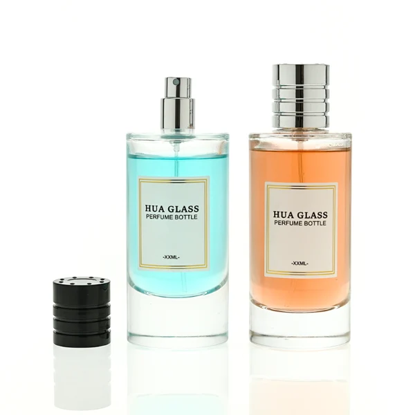 HUA0458 perfume bottle features a clear, thick-bottomed cylindrical glass body paired with a ribbed cylindrical plastic cap in black, brown, or silver. it offers 80ml and 85ml capacity choices, combining a classic round profile with reliable durability for wholesale fragrance markets.