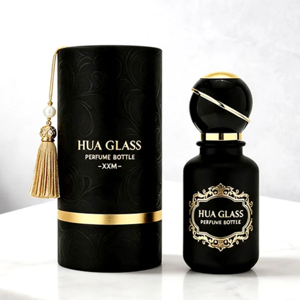 two cylindrical solid black perfume bottles stand side by side, one in a glossy finish and the other in a matte finish. Both bottles feature a gold logo that reads "aleppo 91613" and are topped with unique, spherical black caps encircled by a diagonal gold ribbon accent and a gold collar.